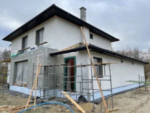 dom piętrowy z dachem kopertowym i garażem 180 m2 Warszawa 19