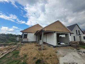 dom parterowy z dachem dwuspadowym i garażem 140 m2 Poznań 11