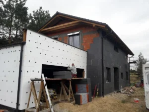 dom piętrowy z dachem dwuspadowym i garażem 250 m2 Poznań 16