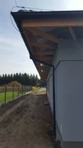 dom szkieletowy parterowy z dachem dwuspadowym i garażem 170 m2 Poznań 7