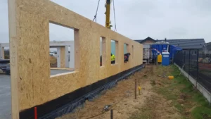 dom szkieletowy parterowy z dachem dwuspadowym i garażem 170 m2 Poznań 1