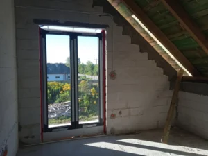 dom z użytkowym poddaszem, dachem dwuspadowym i garażem 240 m2 Łódź