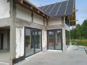 dom z użytkowym poddaszem, dachem dwuspadowym i garażem 240 m2 Łódź