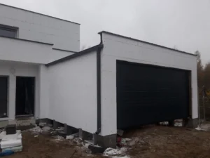 dom piętrowy z dachem płaskim i garażem 230 m2 Poznań