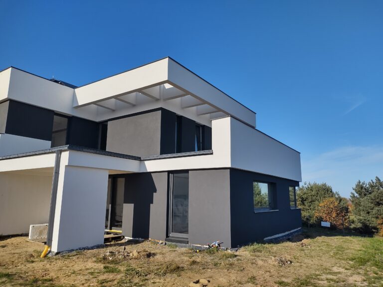 Domy energooszczędne Trójmiasto - dom piętrowy z dachem płaskim i garażem