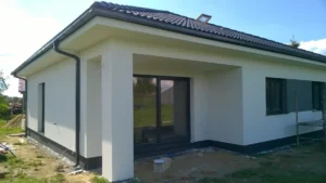 Firma budowlana Poznań - dom parterowy z dachem kopertowym